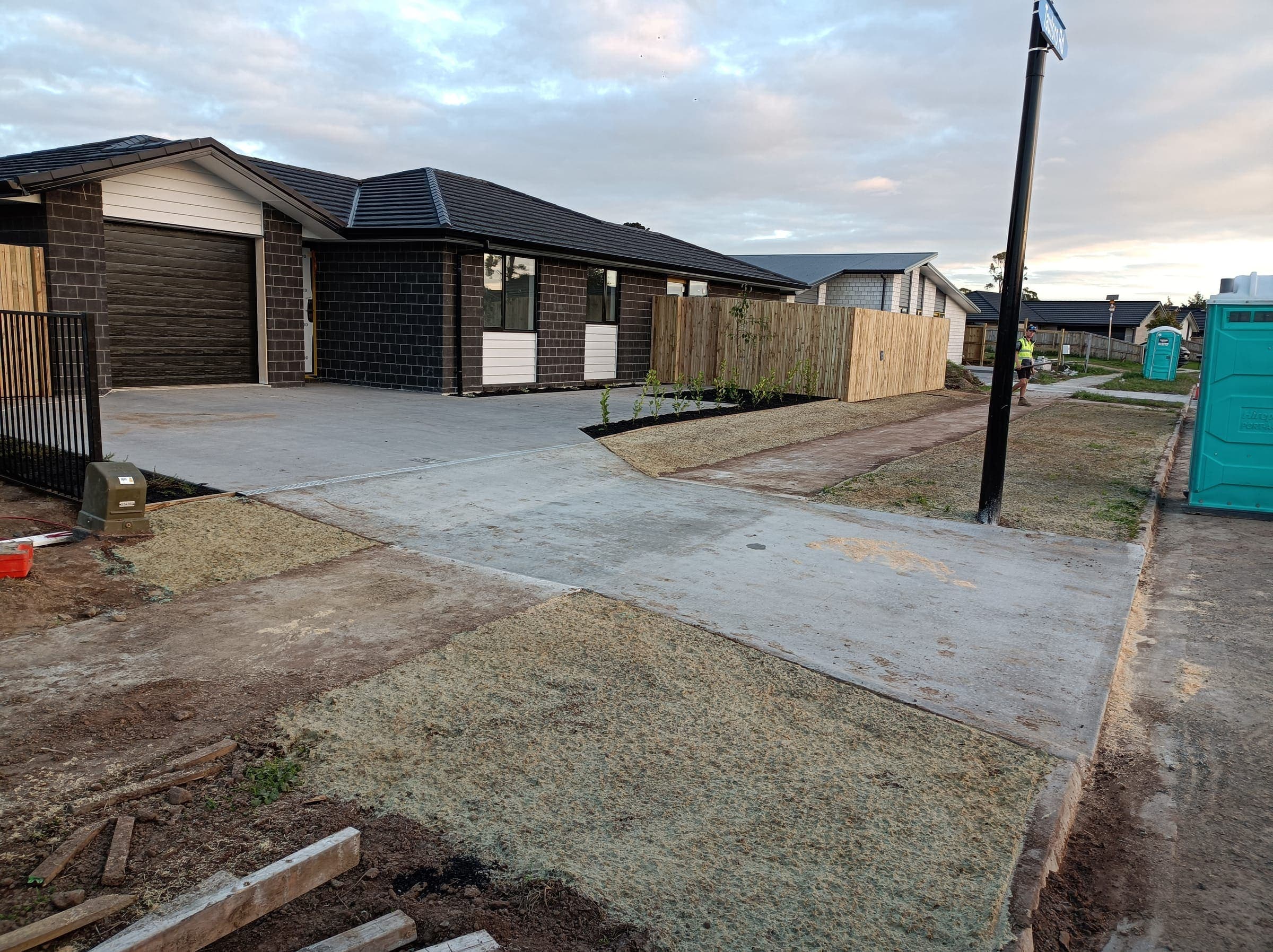 Freshly poured driveway ready for cutting and sealing