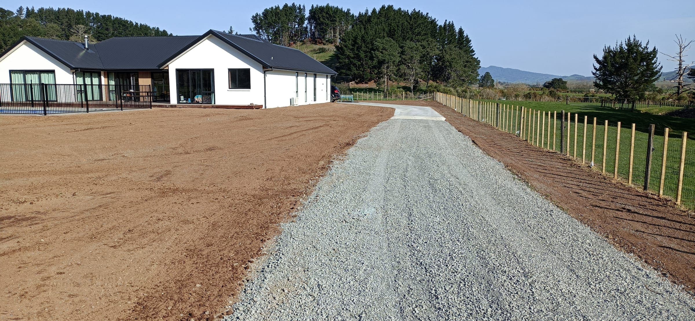 Lawn terrace below a retaining wall